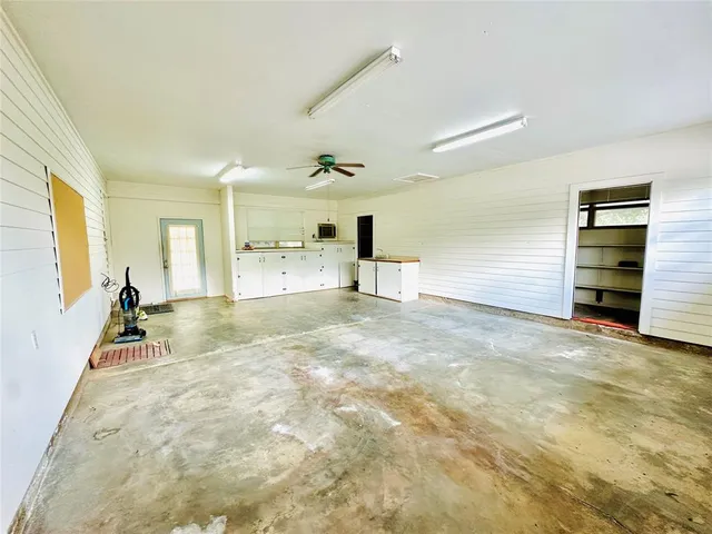 a view of a room with washer and dryer
