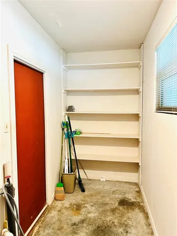 a view of a backyard of the house