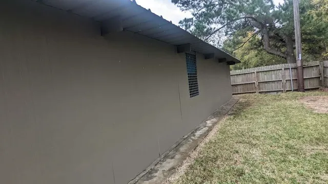 a backyard of a house with lots of green space