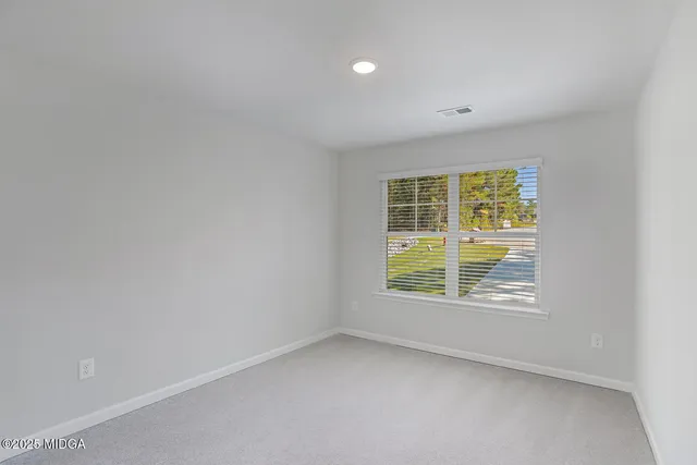 an empty room with a window