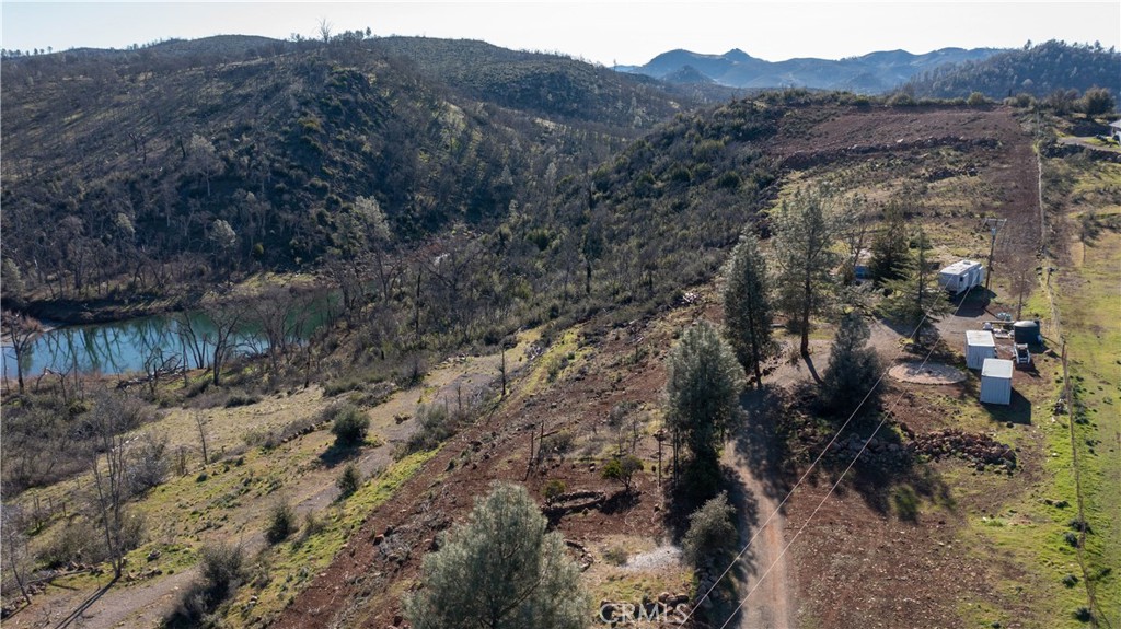 21541 Yankee Valley Road Hidden Valley Lake, CA 95467 - Photo 2 of 75 a view of a forest with a tree