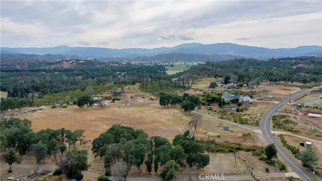 a view of mountain view with lots of trees