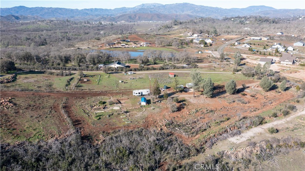 21541 Yankee Valley Road Hidden Valley Lake, CA 95467 - Photo 67 of 75 an aerial view of mountain with trees all around