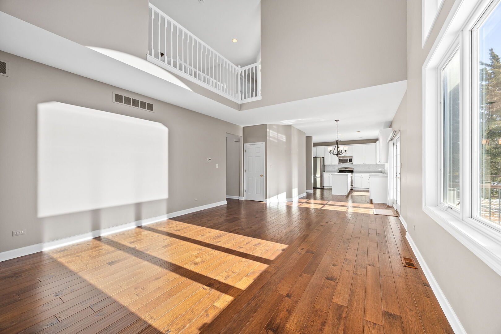 459 59th Street Lisle, IL 60532 - Photo 20 of 57 a view of an empty room with wooden floor and a window