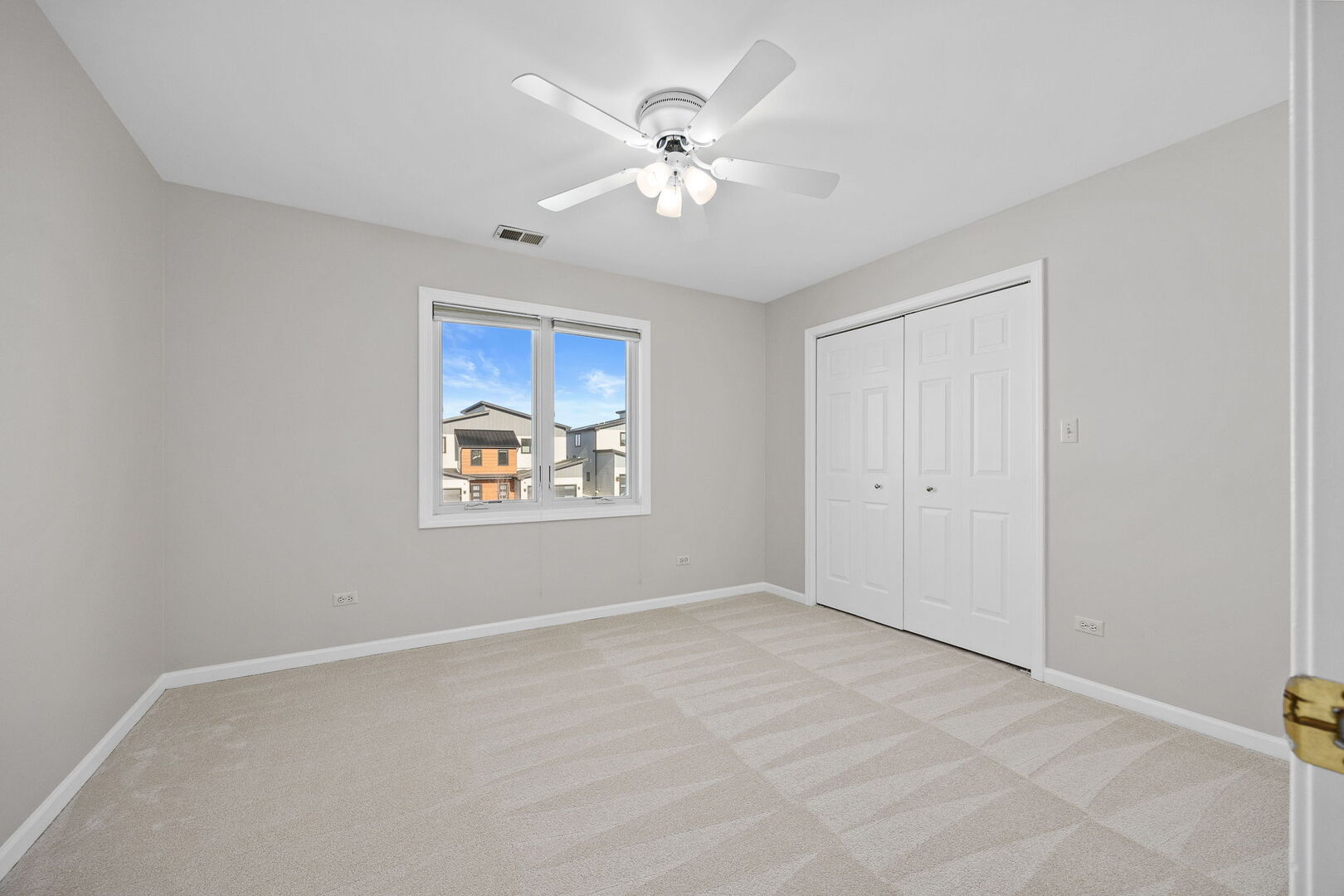 459 59th Street Lisle, IL 60532 - Photo 33 of 57 a view of an empty room with a window
