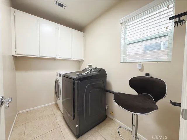 a bathroom with a sink a mirror and a window