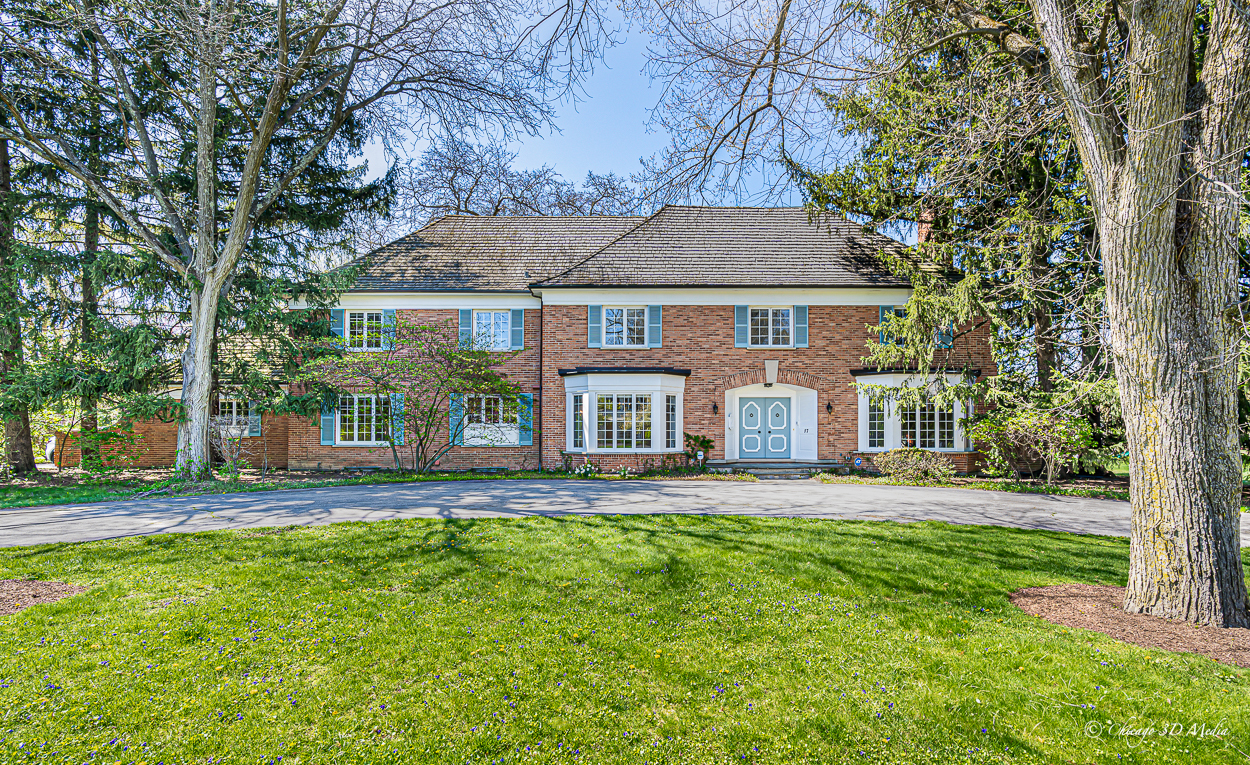 17 Longmeadow Road Winnetka, IL 60093 - Photo 1 of 46 front view of a house with a yard