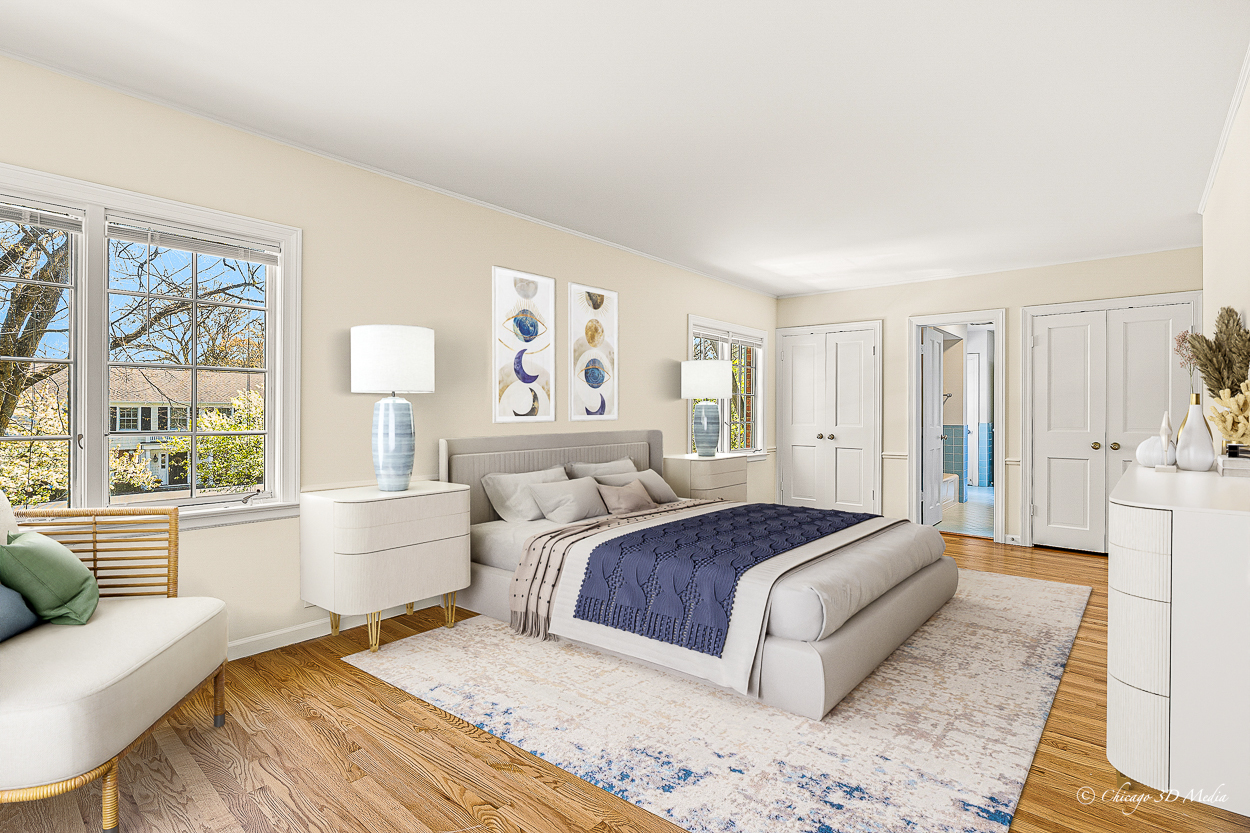 17 Longmeadow Road Winnetka, IL 60093 - Photo 11 of 46 a spacious bedroom with a large bed and a couch