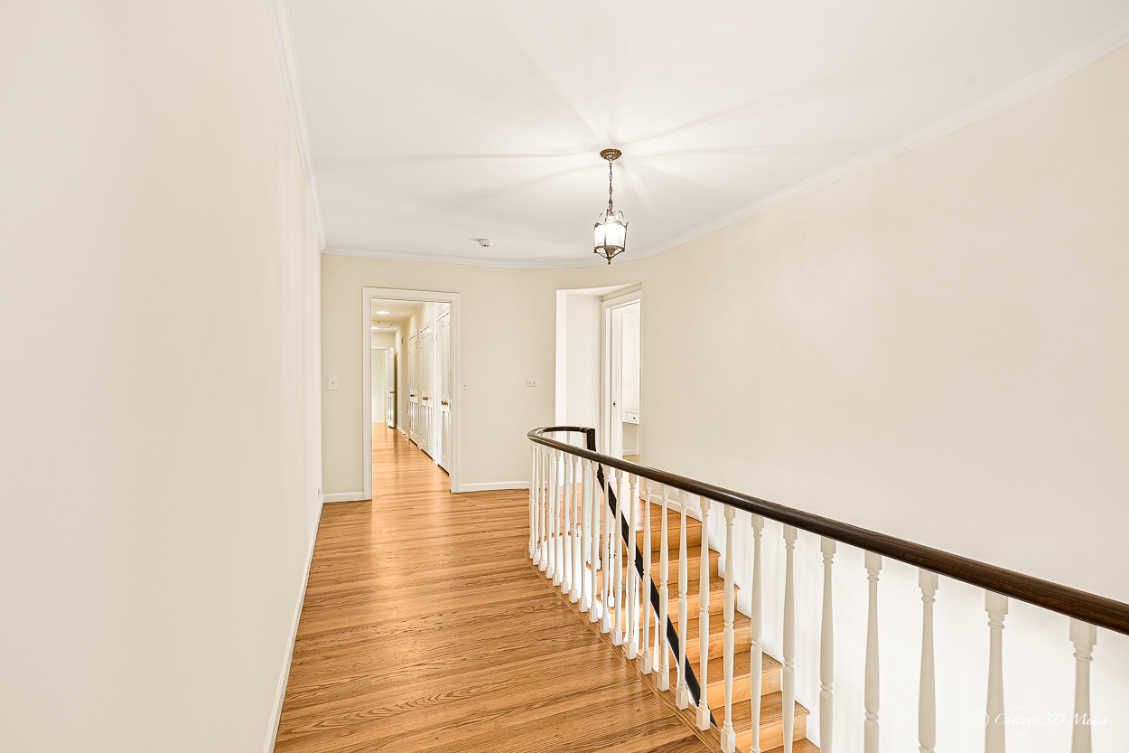 17 Longmeadow Road Winnetka, IL 60093 - Photo 22 of 46 a view of a hallway with wooden floor
