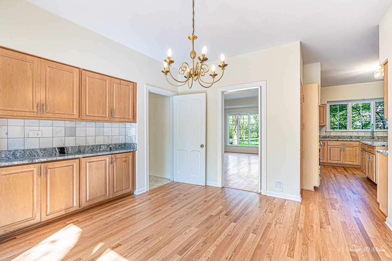 17 Longmeadow Road Winnetka, IL 60093 - Photo 24 of 46 a view of a kitchen with wooden floor and a sink