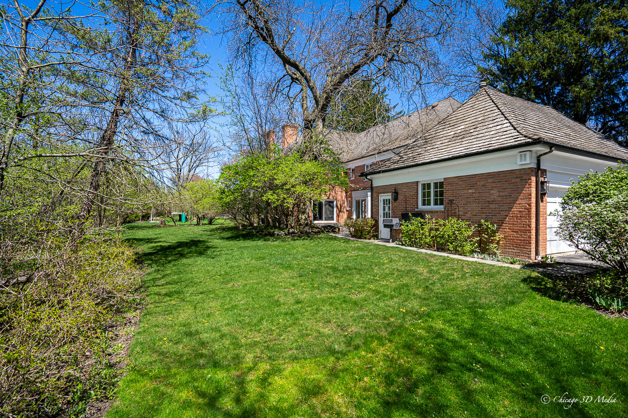 17 Longmeadow Road Winnetka, IL 60093 - Photo 30 of 46 a view of a house with a yard