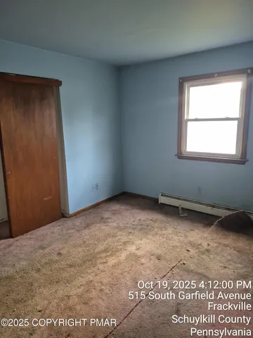 a view of a house with a big yard