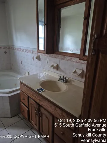 a bathroom with a sink and a bathtub