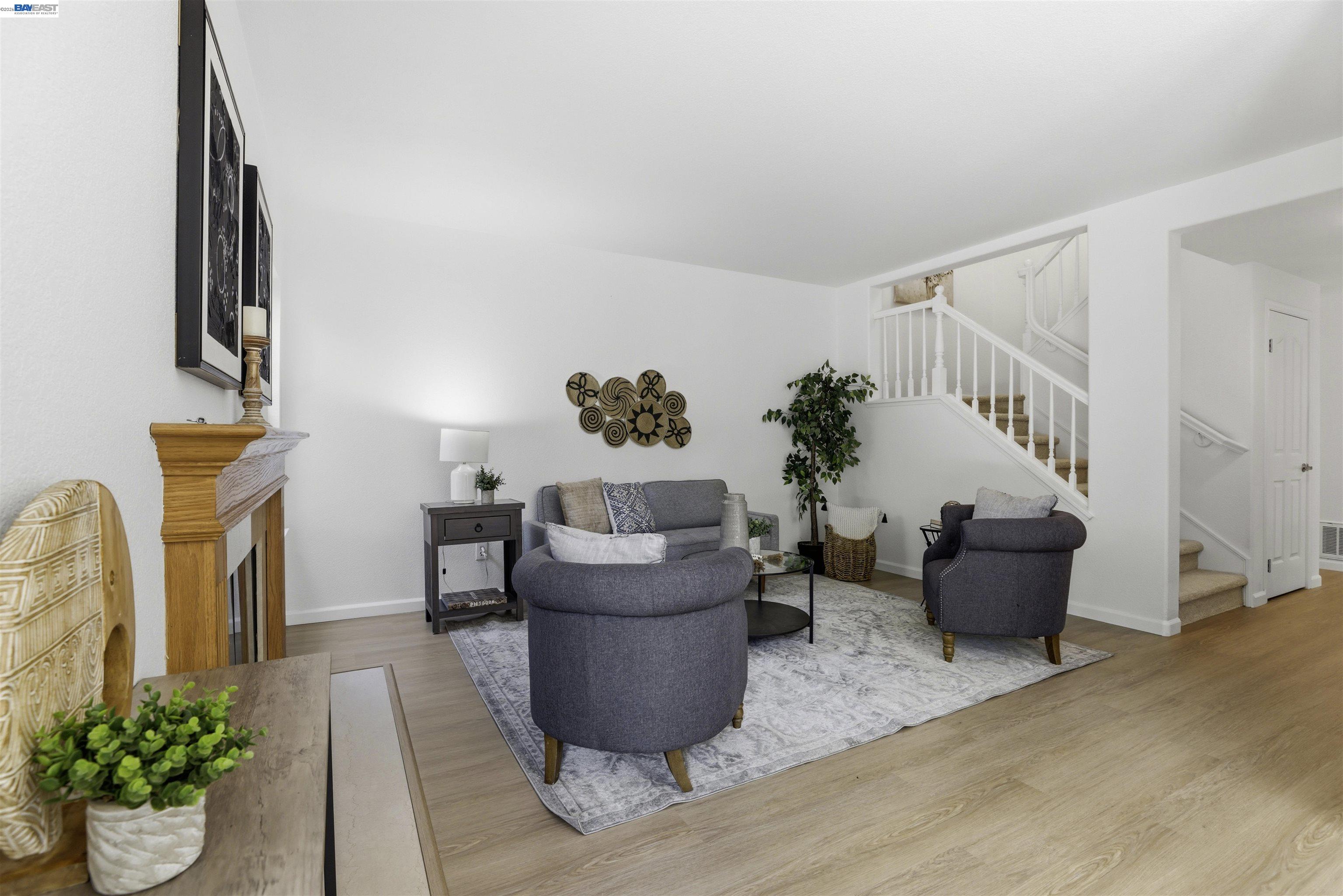 4161 Garibaldi Place Pleasanton, CA 94566 - Photo 13 of 47 a living room with furniture and a potted plant