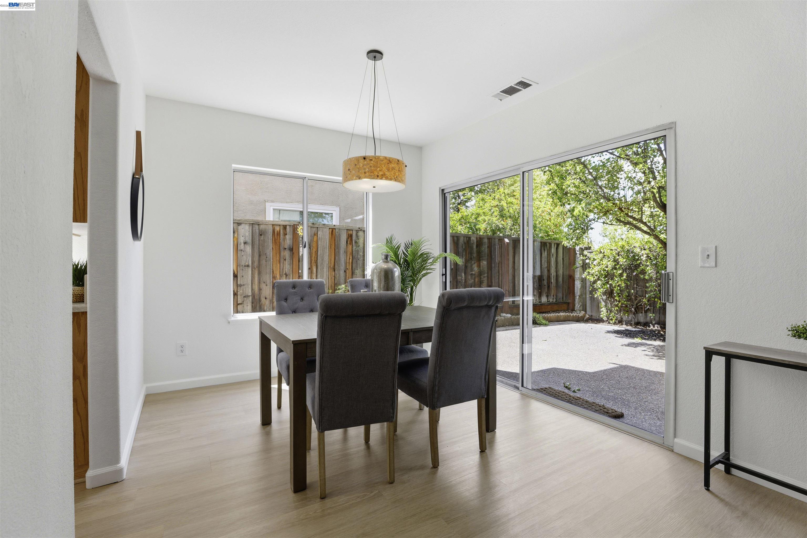 4161 Garibaldi Place Pleasanton, CA 94566 - Photo 17 of 47 a view of a dining room with furniture window and outside view