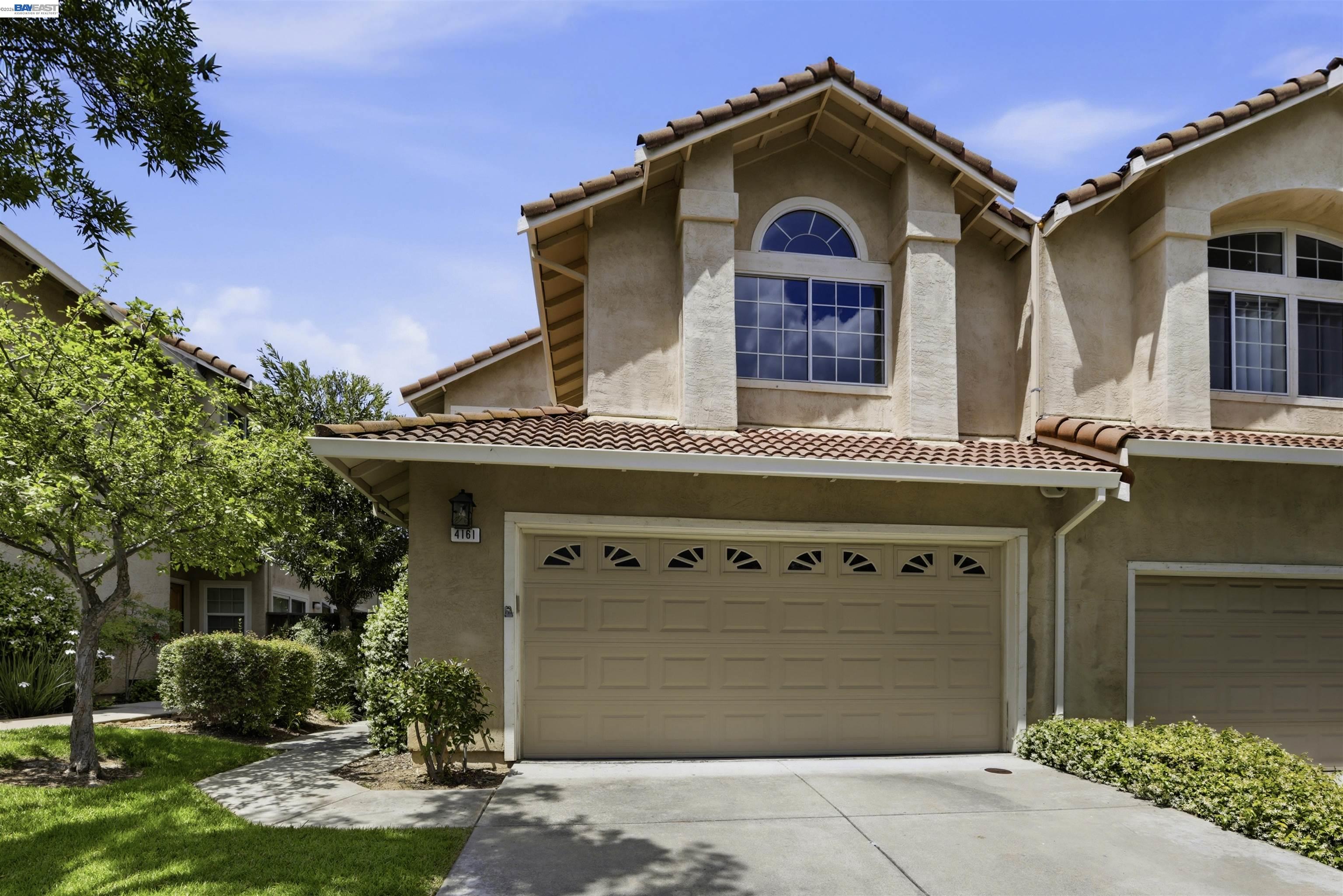 4161 Garibaldi Place Pleasanton, CA 94566 - Photo 2 of 47 a front view of a house