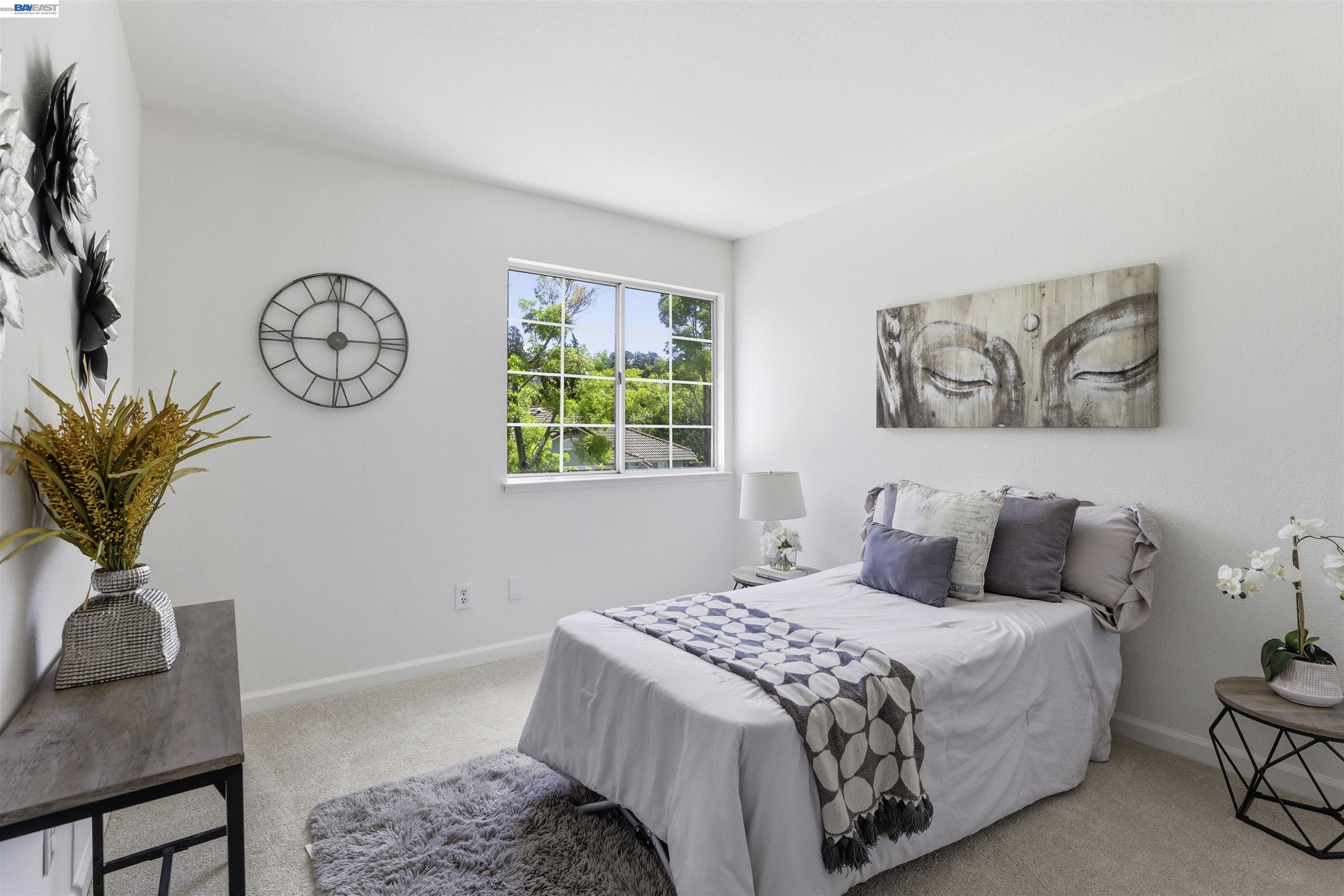 4161 Garibaldi Place Pleasanton, CA 94566 - Photo 29 of 47 a bedroom with a bed and a chair