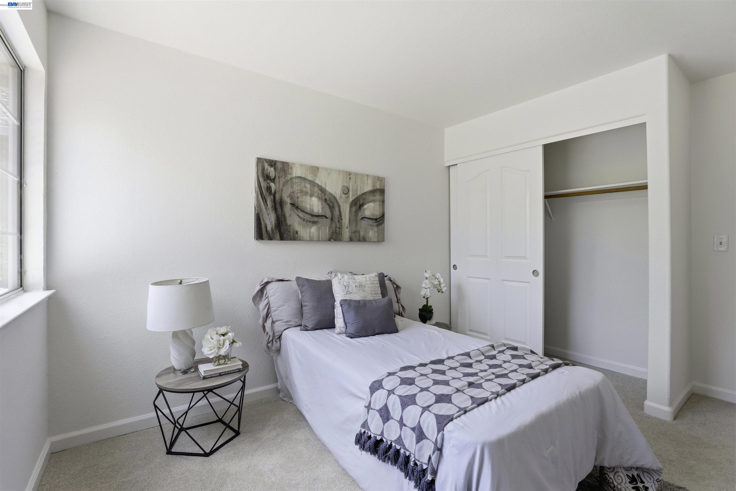 4161 Garibaldi Place Pleasanton, CA 94566 - Photo 30 of 47 a bedroom with a bed and night stand