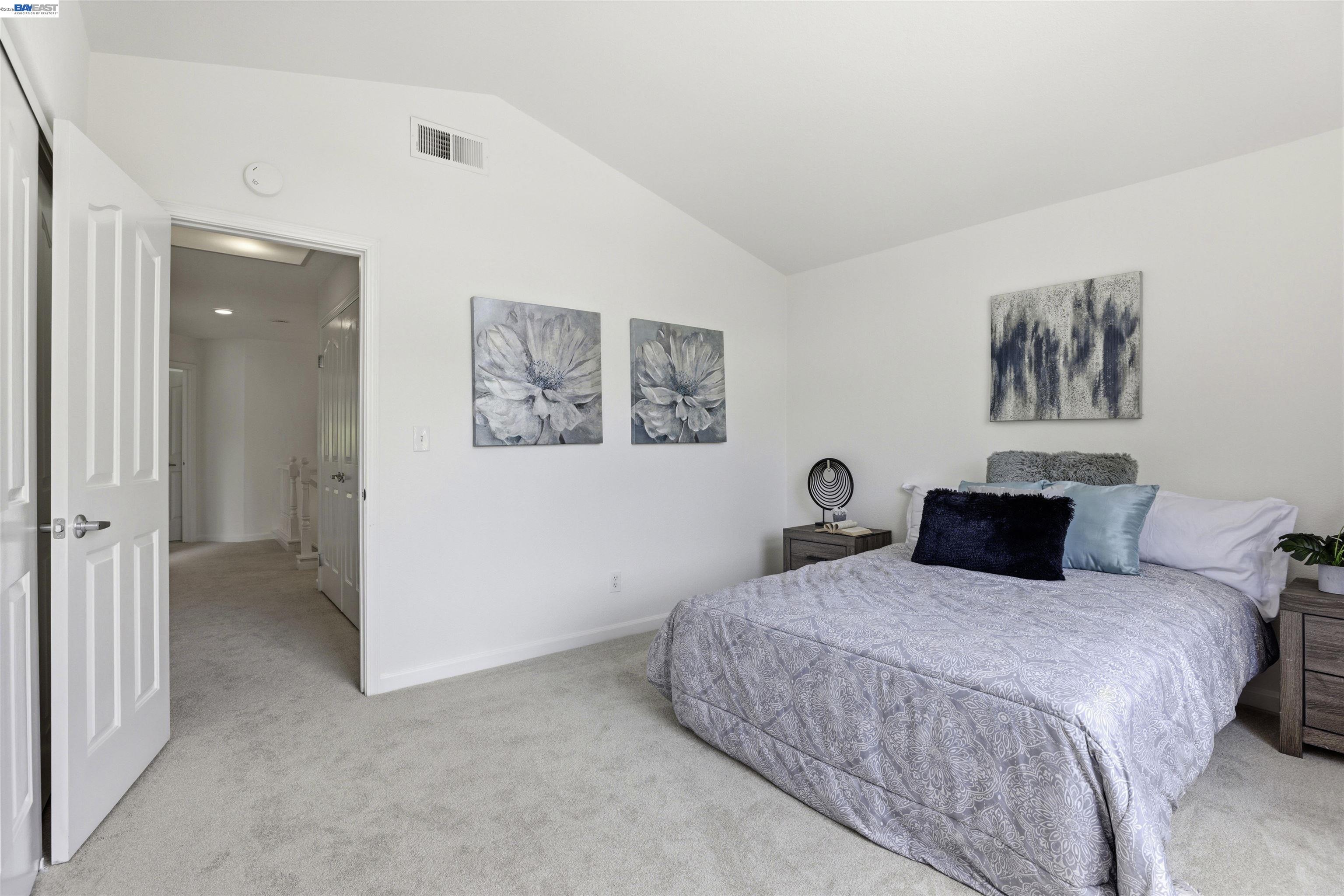 4161 Garibaldi Place Pleasanton, CA 94566 - Photo 32 of 47 a bedroom with a large bed and a painting on the wall