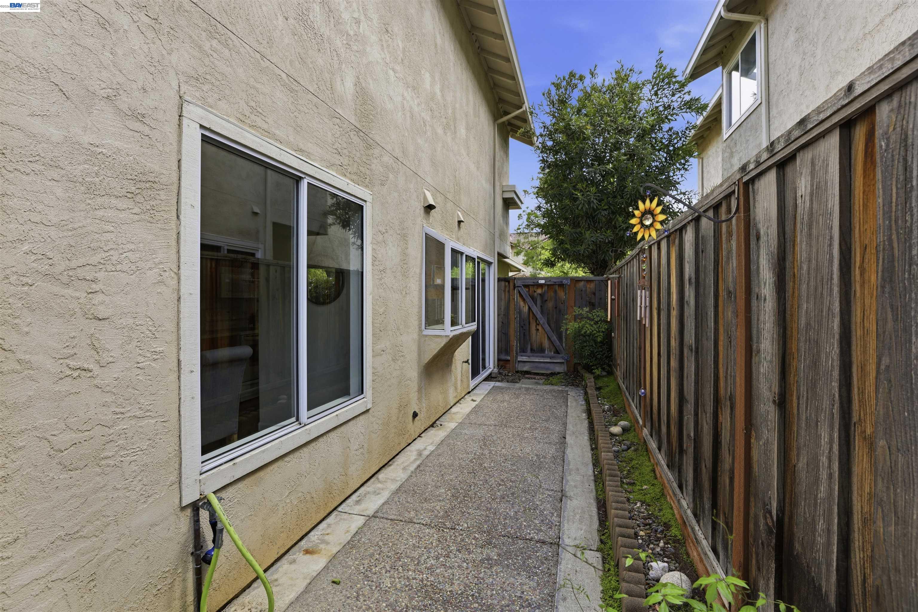 4161 Garibaldi Place Pleasanton, CA 94566 - Photo 42 of 47 a view of a pathway besides a house