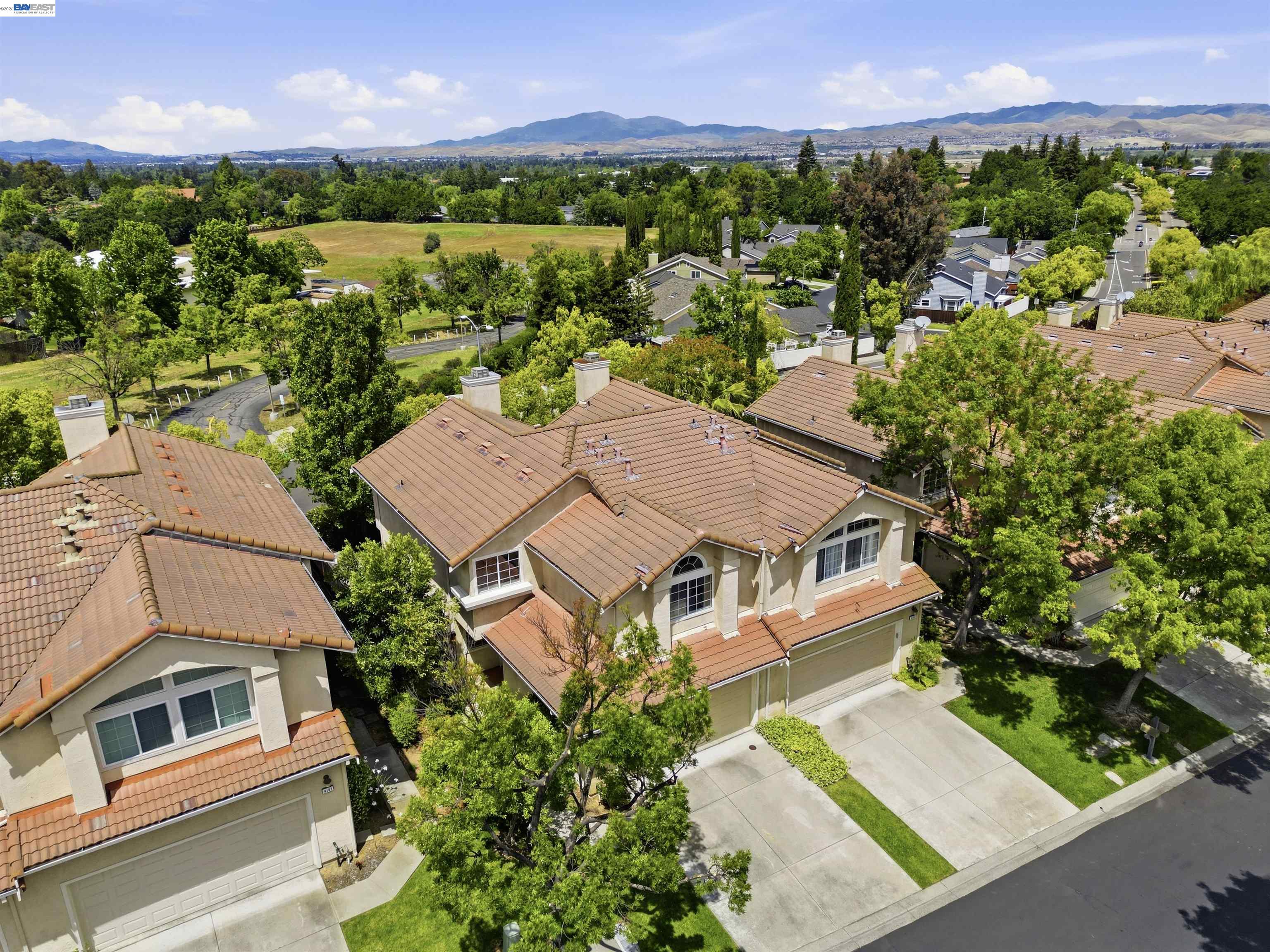 4161 Garibaldi Place Pleasanton, CA 94566 - Photo 43 of 47 an aerial view of residential houses with outdoor space and trees