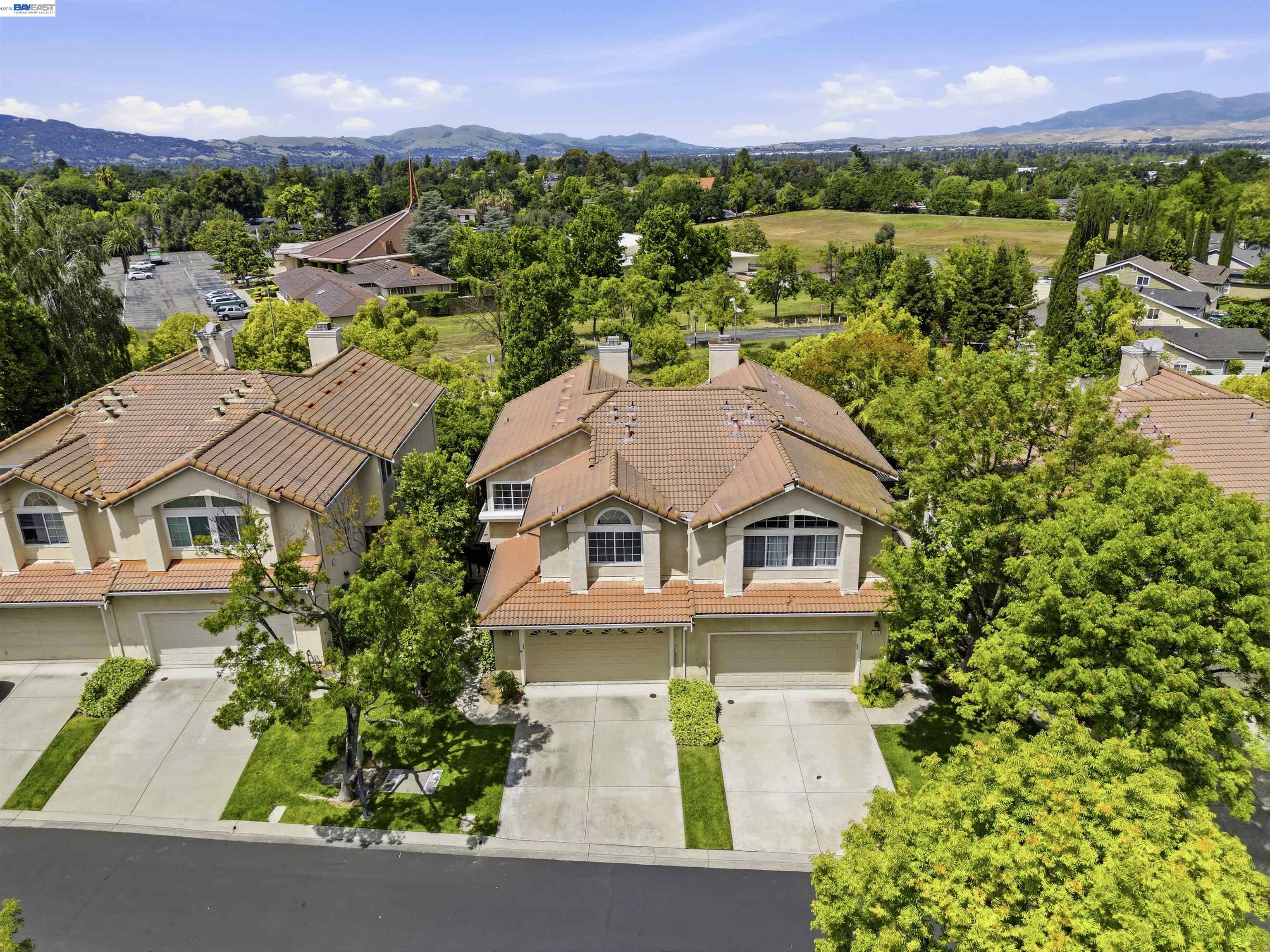 4161 Garibaldi Place Pleasanton, CA 94566 - Photo 45 of 47 an aerial view of residential houses with outdoor space and trees