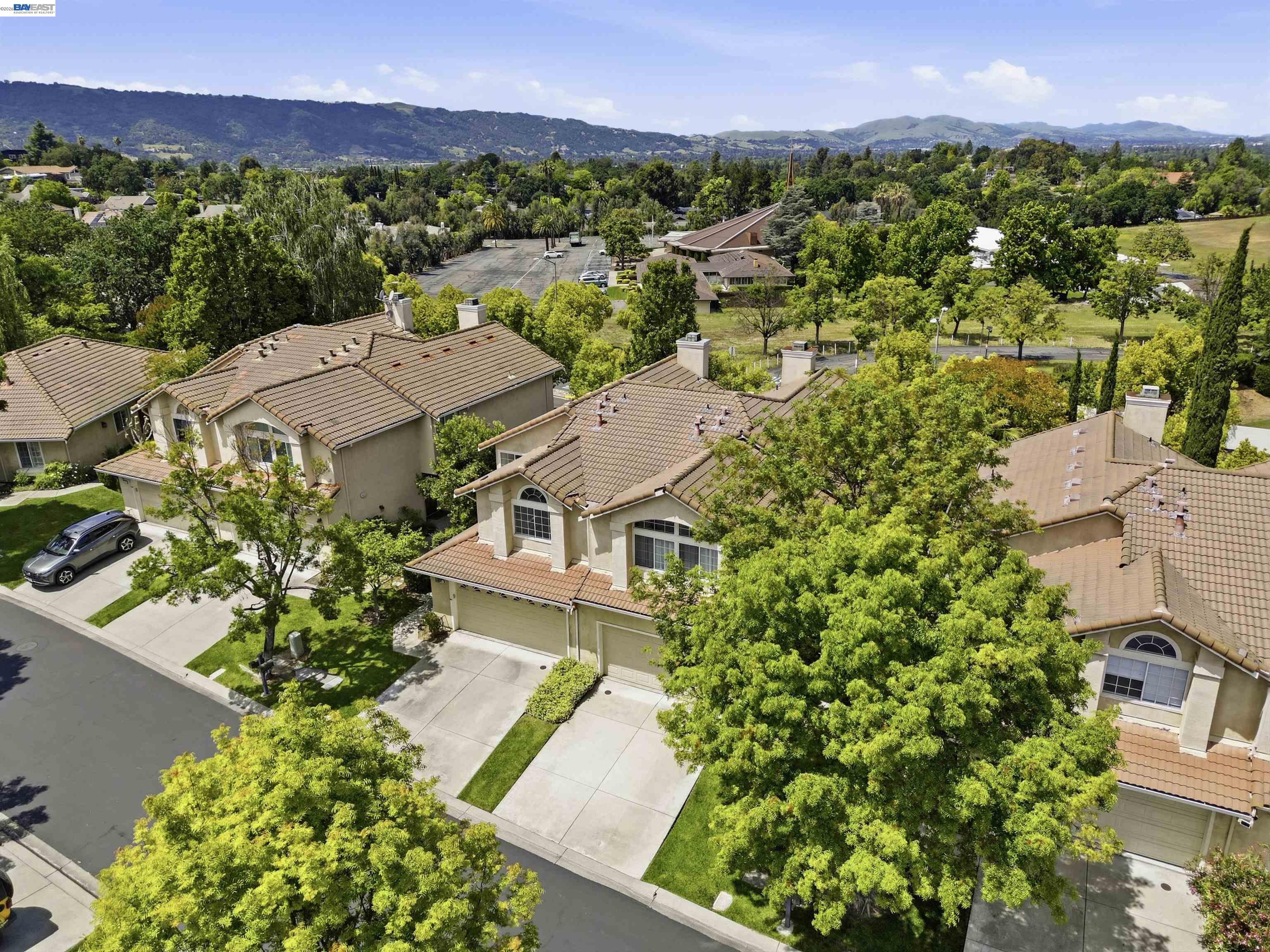 4161 Garibaldi Place Pleasanton, CA 94566 - Photo 46 of 47 an aerial view of residential houses with outdoor space and trees