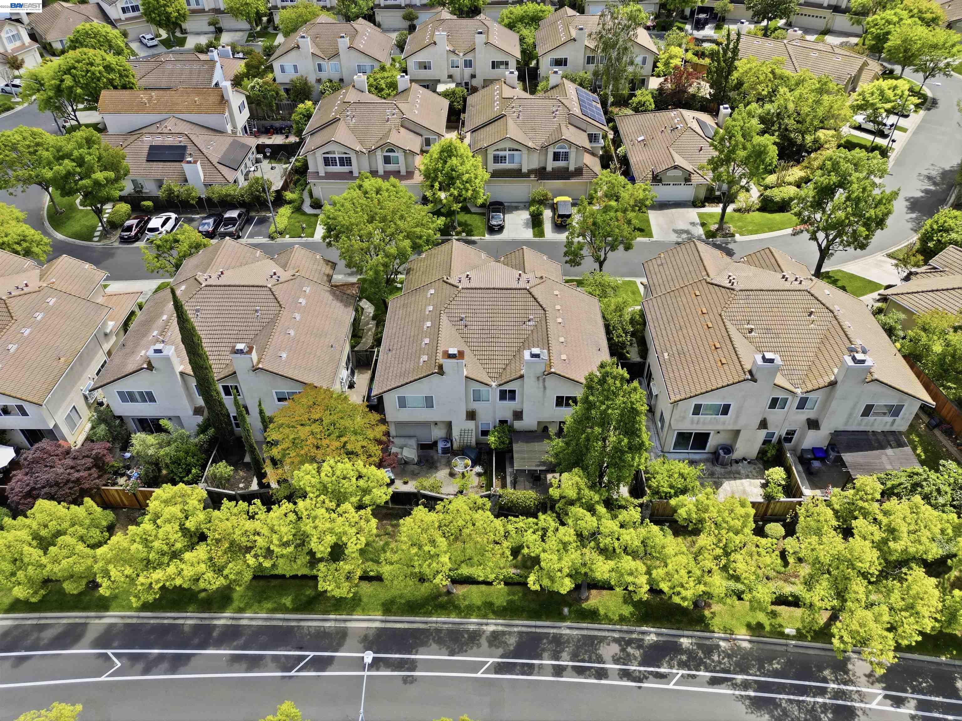 4161 Garibaldi Place Pleasanton, CA 94566 - Photo 47 of 47 an aerial view of a houses with a yard