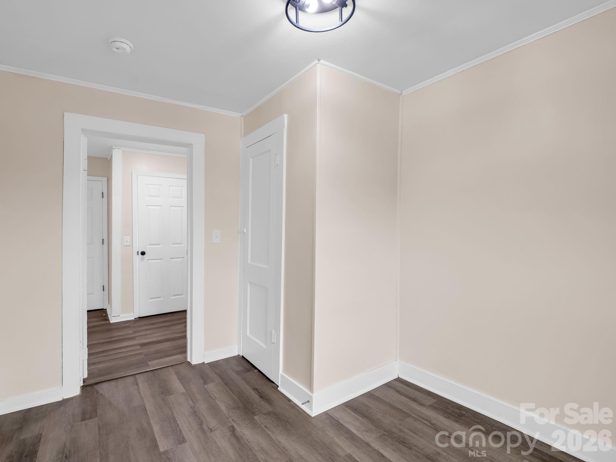 170 Dobbins Road Ellenboro, NC 28040 - Photo 23 of 32 a view of an empty room with wooden floor and a window