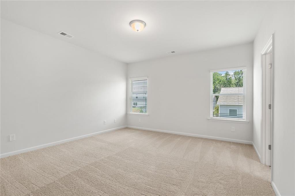 169 Andros Loop Dalton, GA 30721 - Photo 18 of 38 an empty room with windows