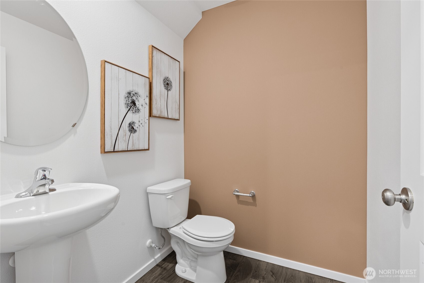 8337 Ostrom Avenue Southeast, Unit 101 Lacey, WA 98513 - Photo 11 of 28 a bathroom with a toilet and a sink