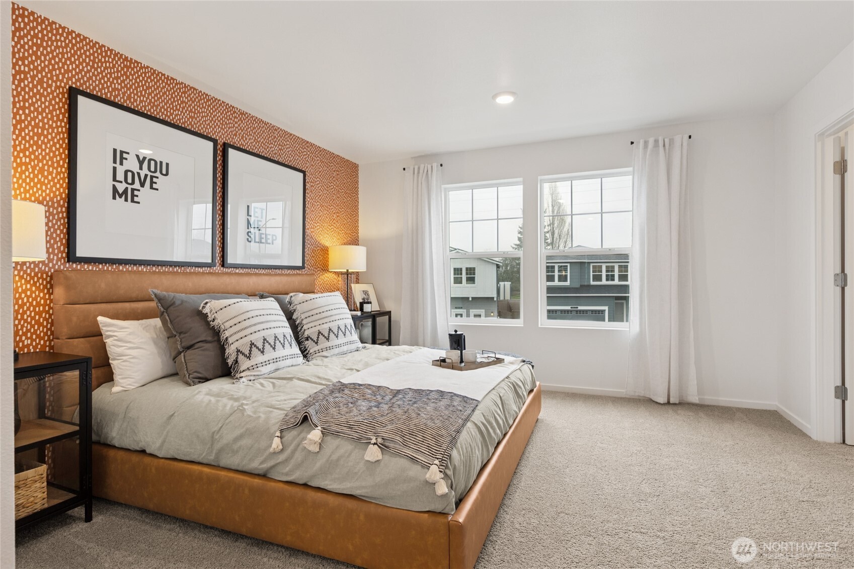 8337 Ostrom Avenue Southeast, Unit 101 Lacey, WA 98513 - Photo 13 of 28 a bedroom with a bed and a window