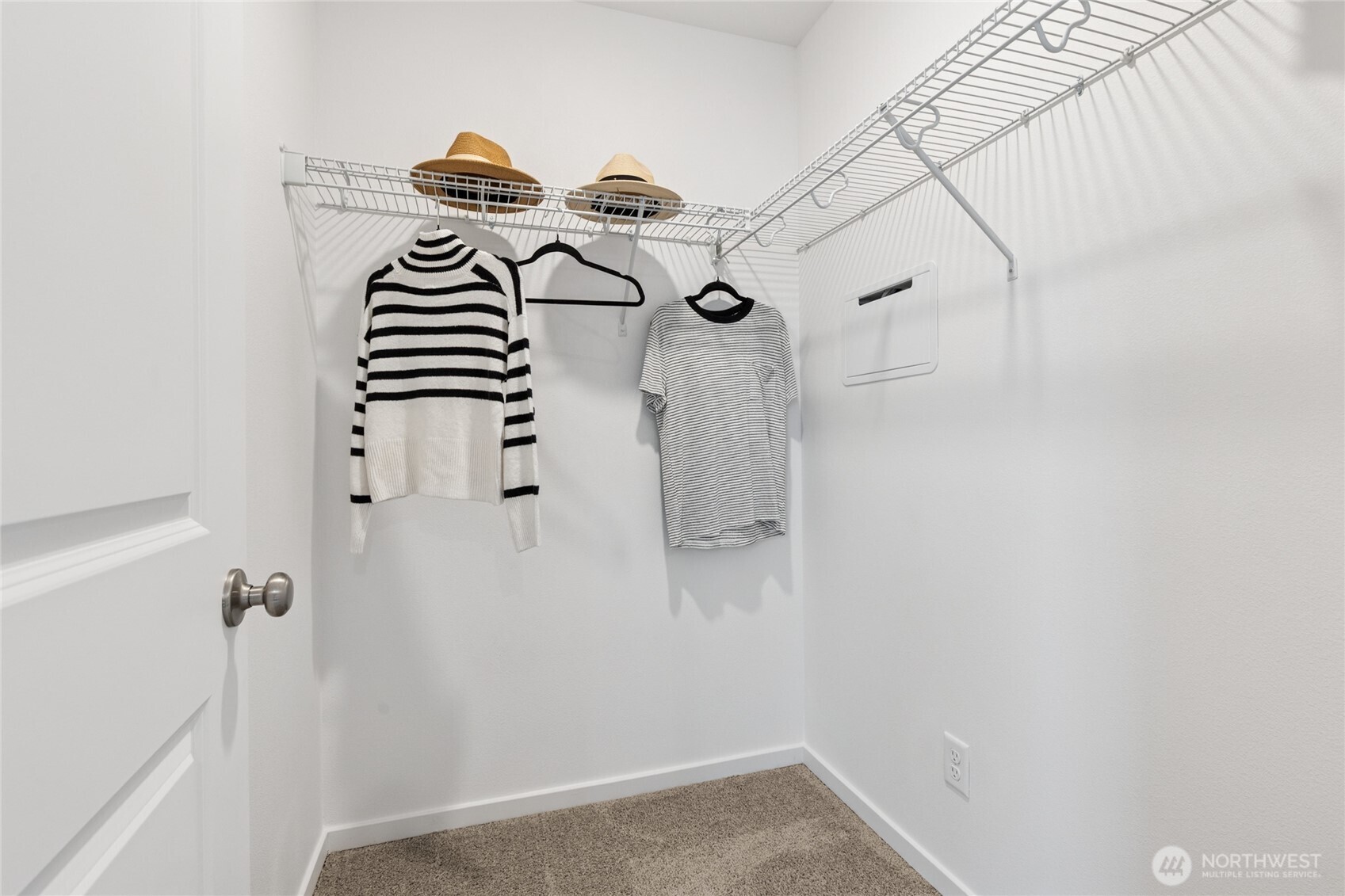 8337 Ostrom Avenue Southeast, Unit 101 Lacey, WA 98513 - Photo 16 of 28 a view of small space with racks on the wall