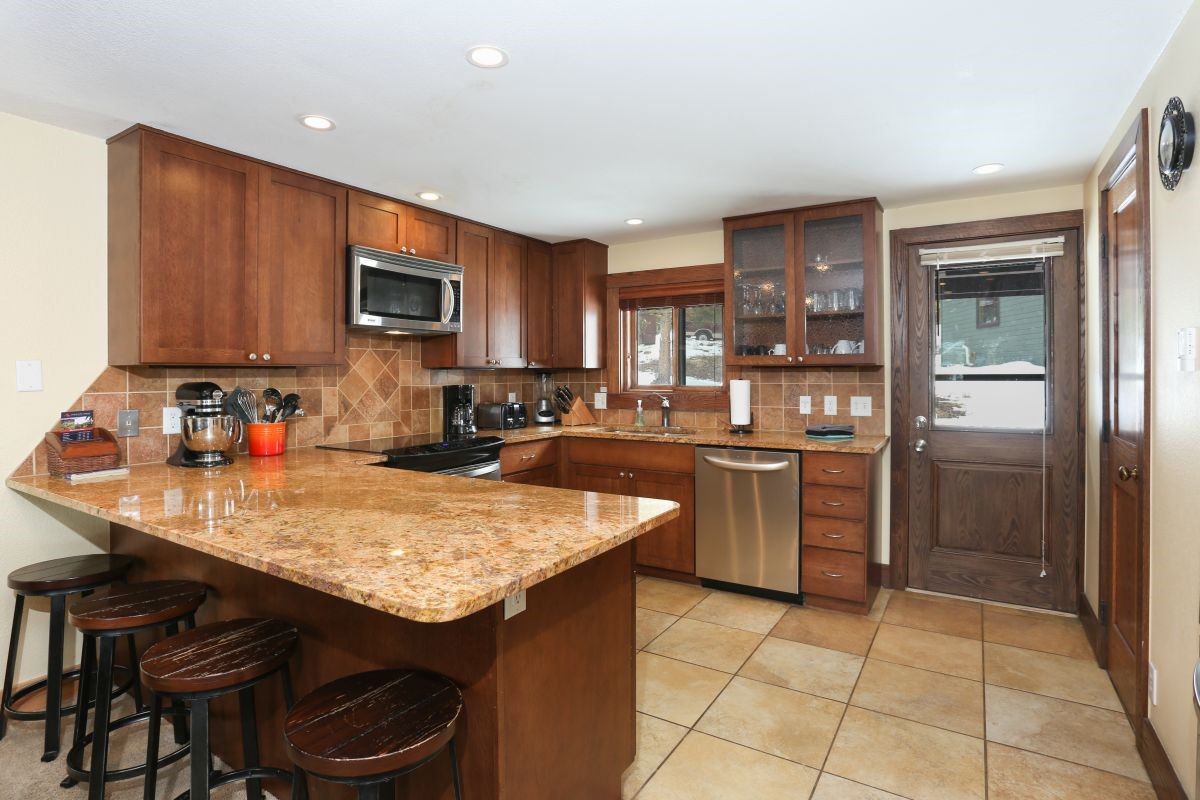 52 Club House Road, Unit 50 Breckenridge, CO 80424 - Photo 2 of 32 Kitchen has back door access to yard