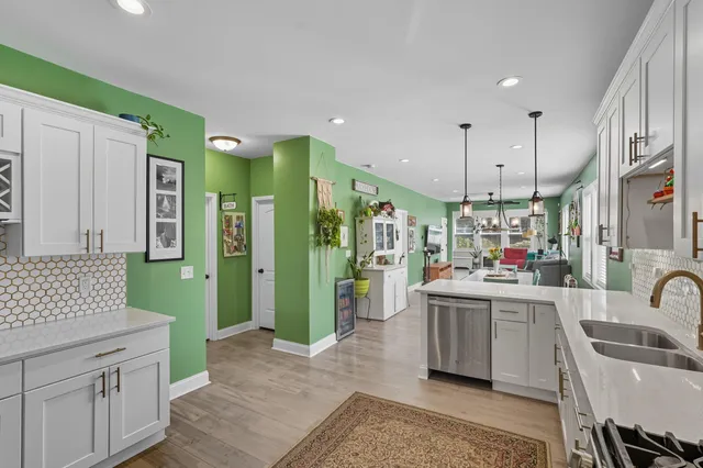 a view of a hallway with stairs