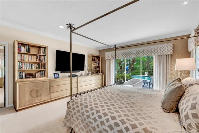 a spacious bathroom with a granite countertop sink mirror and shower