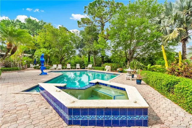 a garden view with a seating space