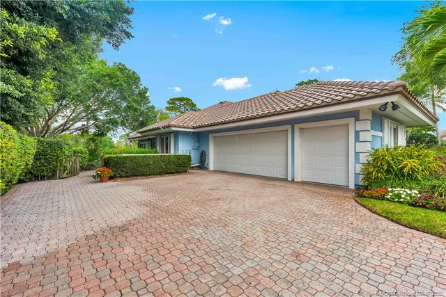 an aerial view of house with yard