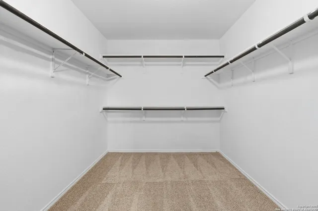 a view of a room with racks on the wall