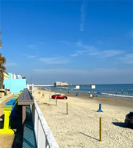 a view of balcony with outdoor seating and stairs