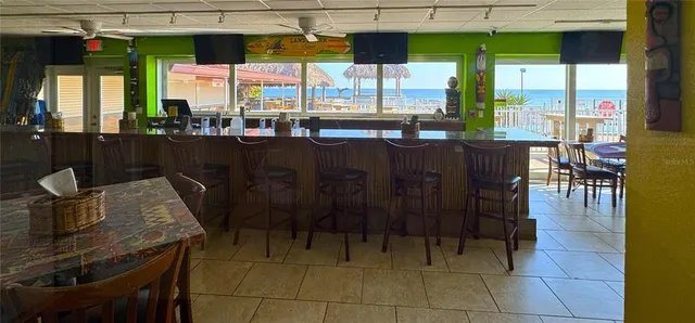 a view of a balcony with furniture