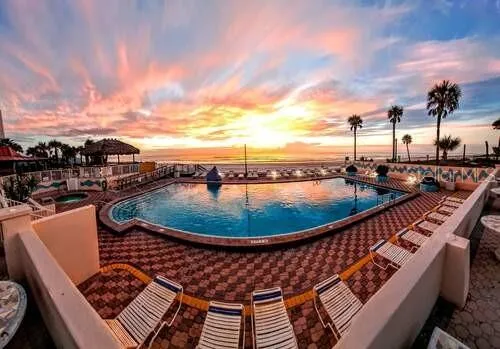 a view of a balcony with ocean view
