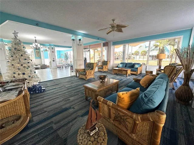 a kitchen with a sink and a stove next to a window