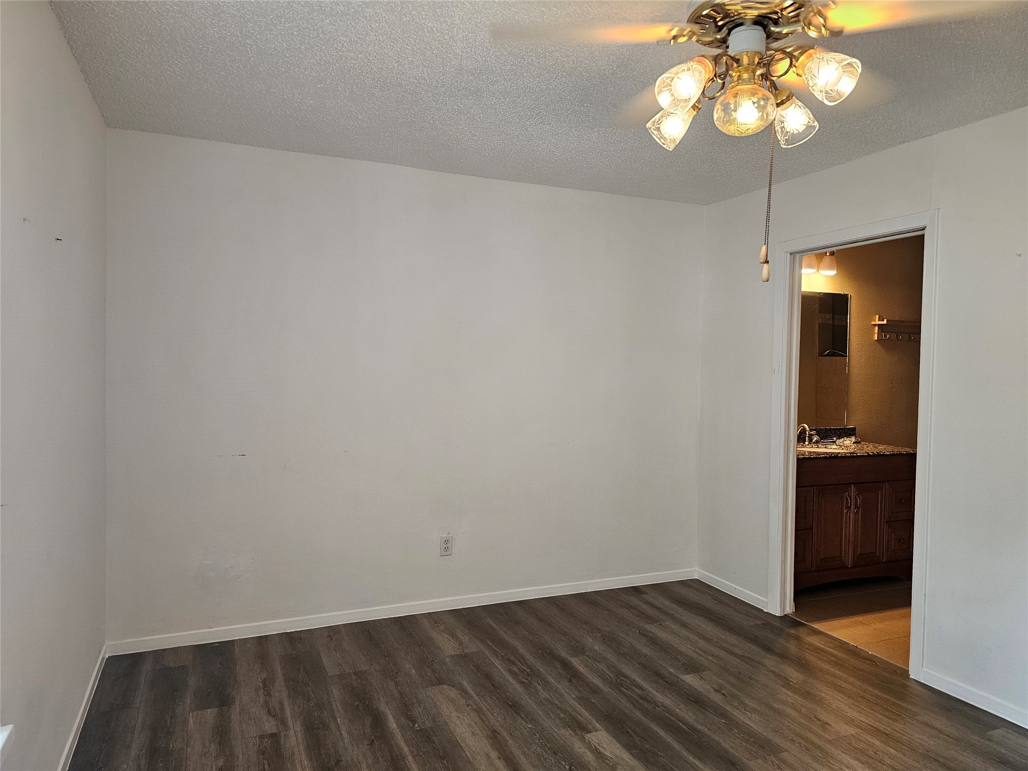 8287 Kingsbrook Road, Unit 268 Houston, TX 77024 - Photo 16 of 50 a view of an empty room and wooden floor