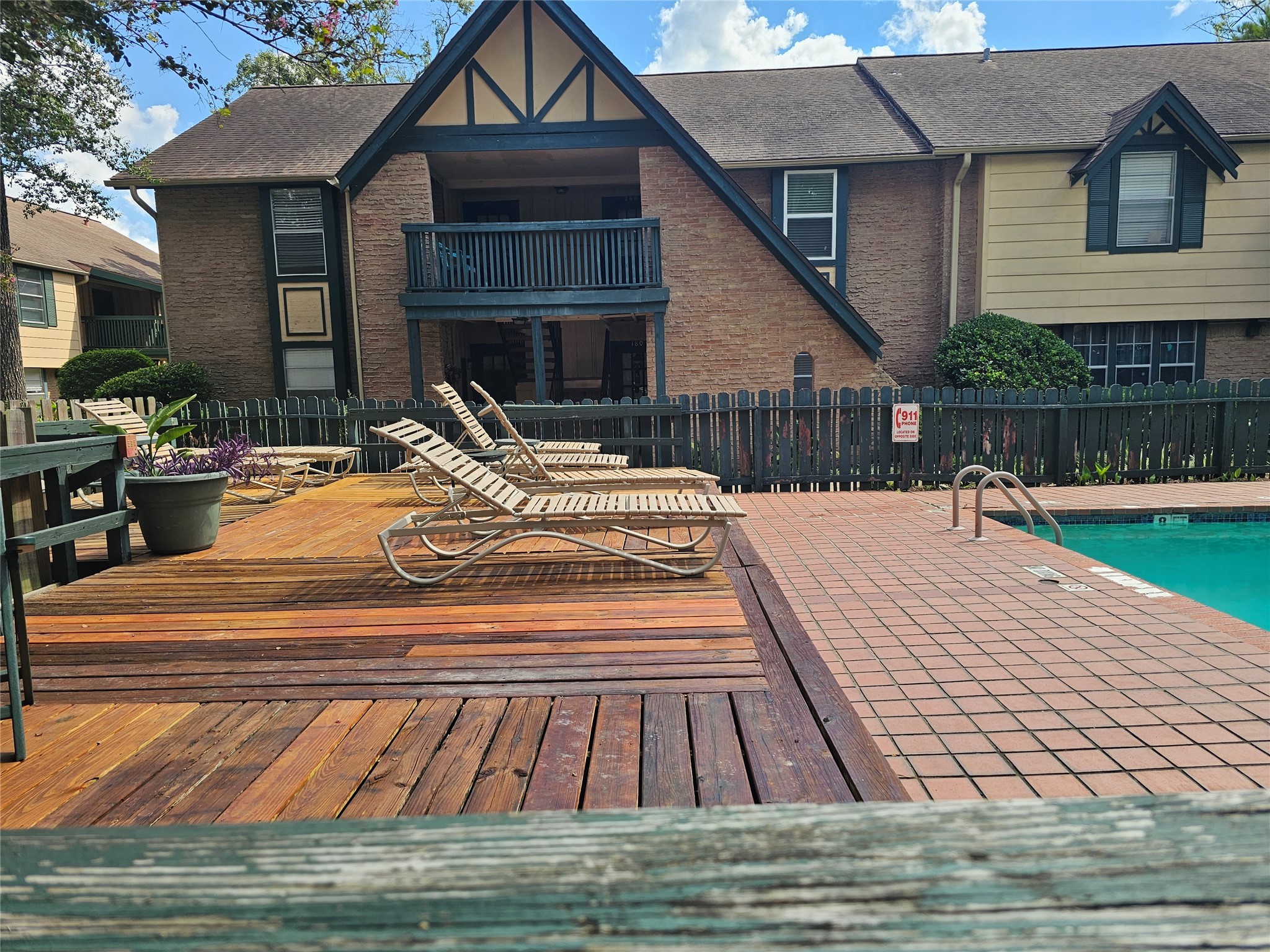 8287 Kingsbrook Road, Unit 268 Houston, TX 77024 - Photo 3 of 50 a view of a house with swimming pool and furniture