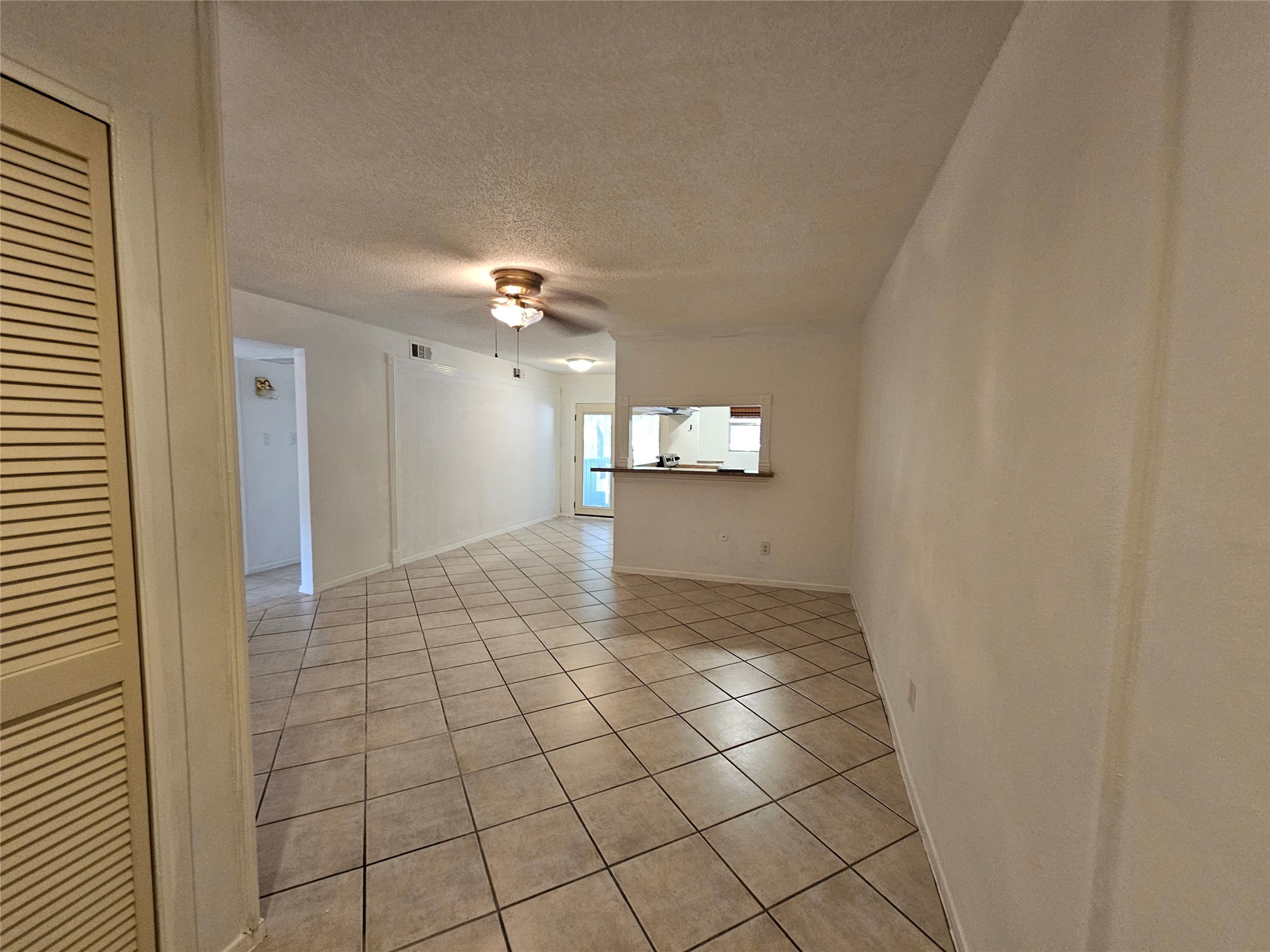 8287 Kingsbrook Road, Unit 268 Houston, TX 77024 - Photo 37 of 50 a view of a hallway to rooms and wooden floor