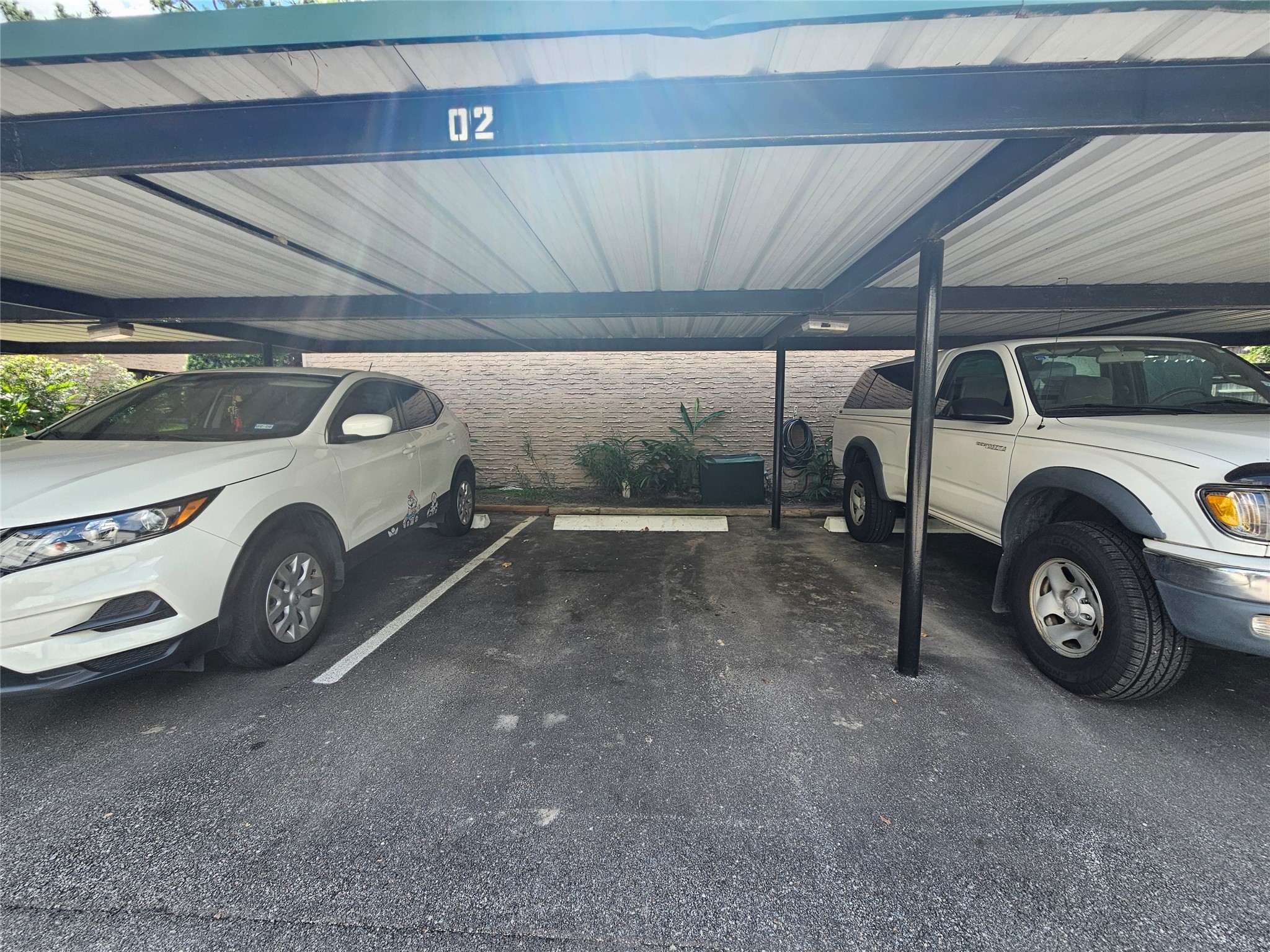 8287 Kingsbrook Road, Unit 268 Houston, TX 77024 - Photo 49 of 50 a view of car garage