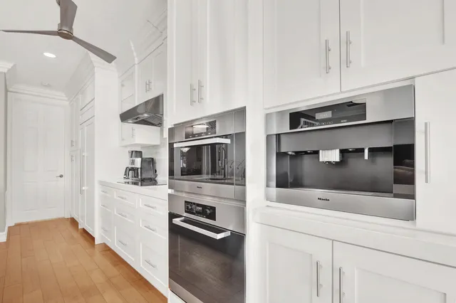 a view of kitchen and dining room with furniture