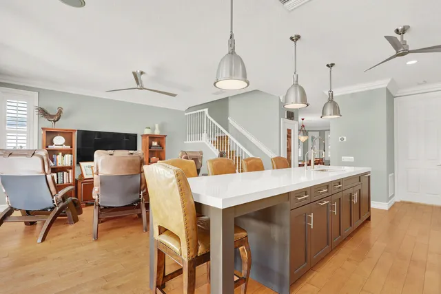a view of kitchen and dining area with furniture