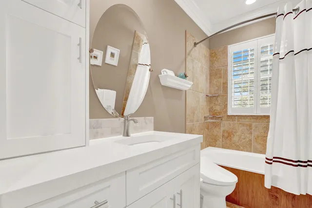 a view of a patio with a table and chairs